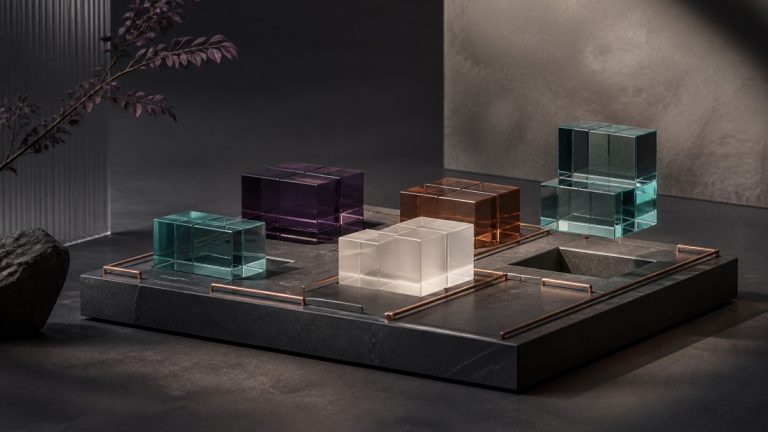 Modular glass and stone editorial composition representing controlled intent-service add-ons